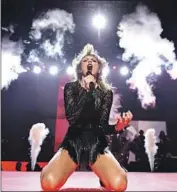  ?? John Shearer Getty Images ?? TAYLOR SWIFT fans are willing to pay exorbitant resale prices for tickets to her upcoming concerts.