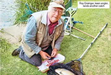  ?? ?? Roy Grainger, keen angler, lands another catch