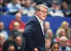  ?? Jessica Hill / Associated Press ?? Getting back in the gym with the Huskies has helped return a small sense of normalcy for UConn women’s basketball coach Geno Auriemma.