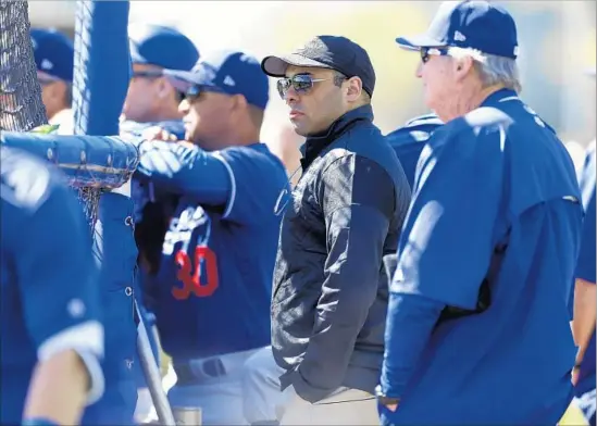  ?? Gary Coronado Los Angeles Times ?? DODGERS General Manager Farhan Zaidi and Manager Dave Roberts (30) share similar philosophi­es, prioritizi­ng f lexibility in roster makeup and player deployment.