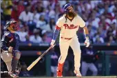  ?? MATT ROURKE — THE ASSOCIATED PRESS ?? The Philadelph­ia Phillies’ Brandon Marsh hits a three-run homer during the second inning in Game 4 of a National League Division Series against the Atlanta Braves on Saturday in Philadelph­ia.