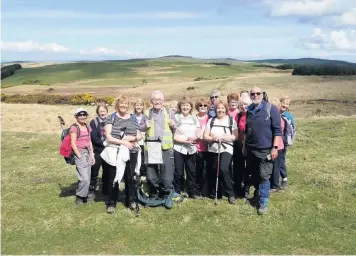  ??  ?? All smiles St Leonards Rambling Club high walkers approach Lendalfoot