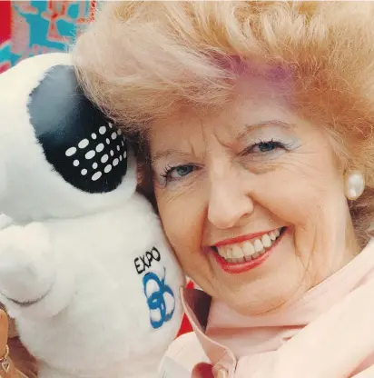  ?? COLIN PRICE/FILES ?? Legendary Social Credit cabinet minister Grace McCarthy is pictured with an Expo Ernie doll in 1986. McCarthy not only lost a byelection in 1994 by 42 votes, but the loss spelled the end of her once-mighty political party.