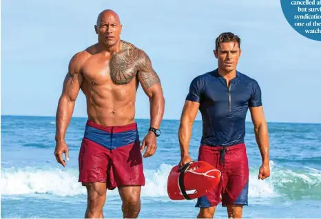  ?? PHOTO: FRANK MASI ?? Dwayne Johnson and Zac Efron in a scene from the movie Baywatch.