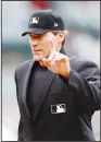  ?? (AP) ?? In this Sept 1, 2019 file photo, home plate umpire Angel Hernandez signals during the fifth inning of a baseball game between the Detroit Tigers and the Minnesota Twins in Detroit.