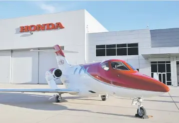  ??  ?? Honda Motor’s HondaJet business airplane is seen at Honda Aircraft Company in Greensboro, North Carolina, US. After three decades building an airplane from scratch, Michimasa Fujino, 56, chief engineer of the Hondajet, might have to reach a ripe old...