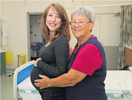  ?? Photo / Doug Sherring ?? Mother and daughter midwives Jill Dale, 61, and pregnant Eleanor McQueen, 30, at North Shore Hospital.
