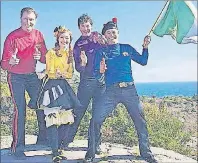  ?? SUBMITTED PHOTO ?? The Wiggles, from left, Simon Pryce, Emma Watkins, Lachy Gillespie and Anthony Field, are shown on location in Quidi Vidi, Newfoundla­nd and Labrador while filming a video for “Squid Jiggin’ Ground” last fall. The video, which also features P.E.I....