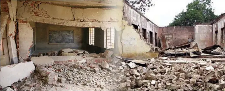  ?? ?? Scene of a school structure attacked by terrorists, another school facility left in ruins after being attacked