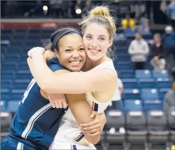  ?? CLOE POISSON | CPOISSON@COURANT.COM ?? Much is needed from seniors Napheesa Collier, left, and Katie Lou Samuelson. “I think we have a lot of players that don’t have a lot of experience playing in games and close games and tough situations, so we have a lot to kind of make up for,” says Samuelson.