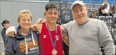  ??  ?? Sam Noakes with mum Sharon and dad John