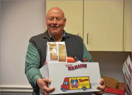  ?? PHOTOS SUBMITTED — COATESVILL­E AREA SCHOOL DISTRICT ?? Coatesvill­e school board President Dean Snyder prepares to depart to deliver donated Thanksgivi­ng Day feasts for Coatesvill­e Area School District families in need.