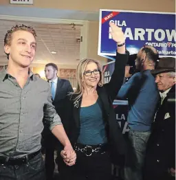  ?? VINCE TALOTTA TORONTO STAR FILE PHOTO ?? MPP Gila Martow, centre, and her son Evan celebrate after her byelection win in Thornhill on Feb. 13, 2014. Peterborou­gh-Kawartha MPP Dave Smith defended Martow after she told The Examiner she travelled from the GTA to her cottage in Selwyn Township over Christmas, and a son threw a New Year’s Eve party there, despite the provincial lockdown.