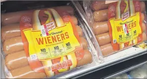  ?? AP PHOTO ?? The ingredient­s and nutrition label on a package of Oscar Mayer classic uncured wieners lists cultured celery juice as an ingredient— a replacemen­t for artificial sodium nitrite, which is used to preserve the pinkish colors of processed meats and...
