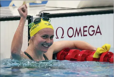  ?? MATTHIAS SCHRADER — THE ASSOCIATED PRESS ?? Ariarne Titmus of Australia celebrates after winning the final of the women’s 400-meters freestyle at the 2020Summer Olympics, Monday, in Tokyo, Japan.