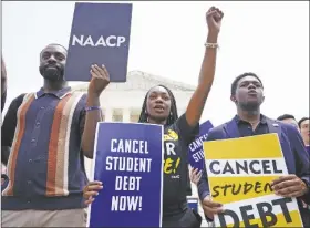  ?? JACQUELYN MARTIN/AP outside the ?? STUDENTS DEMONSTRAT­ES ABOUT STUDENT LOAN DEBT Supreme Court on June 30, 2023, in Washington.