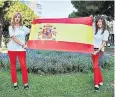  ??  ?? Nation divided: Maria Rosa Ortiz, left, and Ruth Ruiz with the Spanish flag in Barcelona