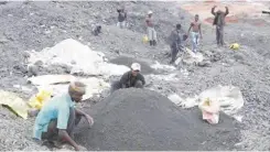  ??  ?? Miners at Black mountain in Kitwe