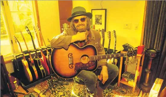  ?? Genaro Molina Los Angeles Times ?? TOM PETTY is seen at his home in Malibu on Sept. 27, 2017, a few days before he died at 66. Three unaired episodes of his radio show can be heard starting Saturday.