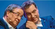  ?? Foto: Guido Kirchner/dpa (Archiv) ?? Markus Söder (CSU, rechts) will Kanzlerkan­didat der Union werden, Armin Laschet (CDU) ebenfalls.