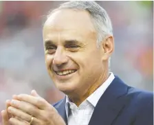  ?? PATRICK SMITH/GETTY IMAGES FILES ?? Rob Manfred says it’s time to think outside the box. He’s open to doublehead­ers and seven-inning games.