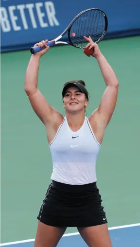  ?? CP PHOTO ?? Bianca Andreescu celebrates defeating Daria Kasatkina during Round 2 of the Rogers Cup women’s tennis tournament in Toronto on Wednesday.