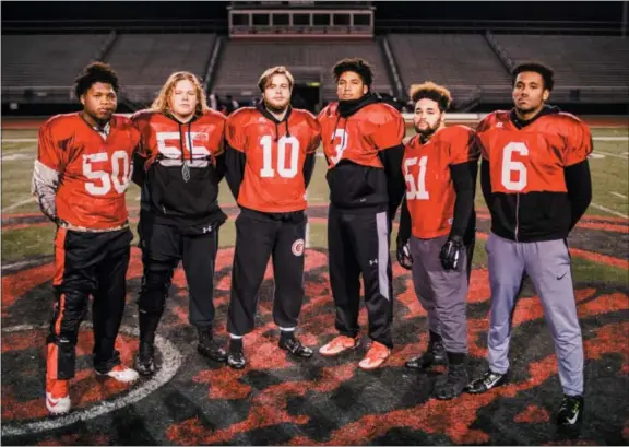  ?? NATE HECKENBERG­ER — FOR DIGITAL FIRST MEDIA ?? Coatesvill­e’s Ayden Geter, Dylan Nichols, Jimmy Limper, Tione Holmes, Jon Meeks and Eric Kirk (left to right) make up a stellar defensive line that has held vaunted rushing attacks at bay all postseason.