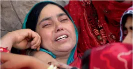  ?? — PTI ?? Slain Army officer Lt. Ummer Fayaz’s mother during his funeral at Sudsona village in Kulgam district on Wednesday. Fayyaz was kidnapped and killed by suspected militants in Shopian district where he was attending a marriage ceremony.
