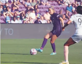  ?? RICARDO RAMIREZ BUXEDA/ORLANDO SENTINEL ?? Pride midfielder Mikayla Cluff, delivering a pass in April’s home opener vs. Angel City FC, is among the young players leading the rebuild.