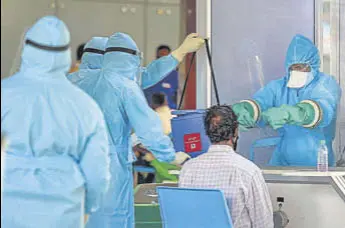  ?? PTI ?? Medics take samples at the Chennai airport on Sunday.