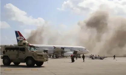  ?? Photograph: Fawaz Salman/Reuters ?? Dust rises after the explosions at Aden airport.