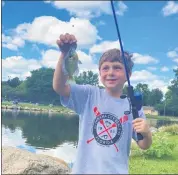  ?? PHOTO COURTESY OF JENNY VAN DUSEN ?? Chace Browe, 7, enjoys this year’s Nature Discovery Camp in Rochester Hills.