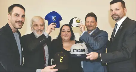  ?? ED KAISER ?? Prospects assistant GM and head coach Jordan Blundell, left, FC Edmonton co-owner Tom Fath, Stingers account executive Kim Manzo, Eskimos president Chris Presson, and Stingers president Brett Fraser partner up to help promote Manzo’s idea of an Ultimate Sports Fan Pass to the city’s loyal sports fans.