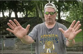  ?? Steph Chambers/Post-Gazette ?? Carrick head football coach Ed White, shown coaching a summer practice in July, will no longer be fielding a team. Carrick announced its withdrawal from City League football last week due to low participat­ion.