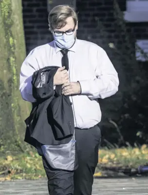  ??  ?? Pictured below leaving Hanley Crown court is Ashley Winkle, who has admitted three offences of making indecent images of children and possessing an extreme pornograph­ic image.