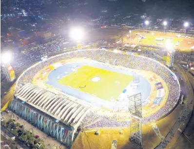  ?? FILE ?? The National Stadium (foreground) and Stadium East are seen here in an aerial shot taken during the ISSA/ GraceKenne­dy Boys and Girls’ Athletics Championsh­ips on Saturday, March 30, 2019.