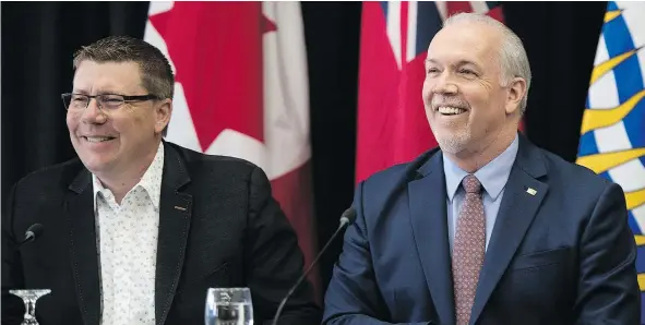  ?? —CP ?? Saskatchew­an’s Scott Moe and B.C.’s John Horgan were not joined by Alberta’s Rachel Notley at the western premiers conference.