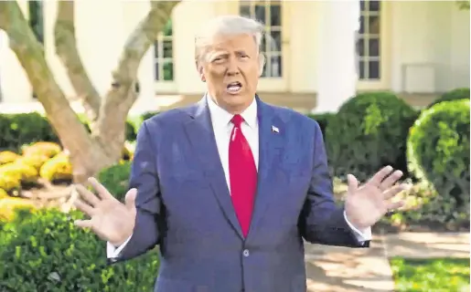  ??  ?? Back at work: President Donald Trump speaks about his treatment for coronaviru­s disease in this still image taken from video last night