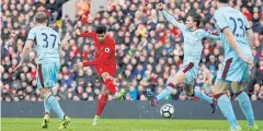  ?? REUTERS ?? Liverpool’s Emre Can shoots to score the winning goal against Burnley.