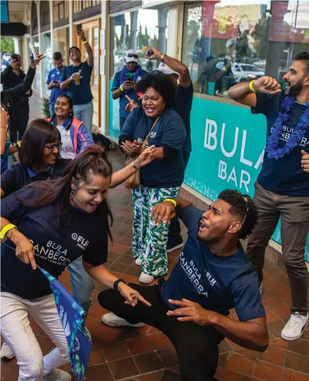  ?? Photo: Leon Lord ?? Fijian Drua fans in their Fiji Airways Bula Canberra t-shirts dancing away at the Bula Bar in Canberra, Australia, on April 14. 2023.