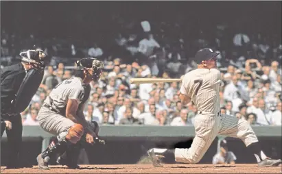  ??  ?? Yankees’ Hall of Famer Mickey Mantle at the bat where he hit 436 home runs, left and right-handed