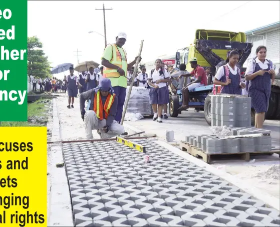  ?? (Photo by Keno George) ?? Making it safer:
Constructi­on of a pavement currently underway on Woolford Avenue, where several city schools are located, will make it safer for schoolchil­dren.