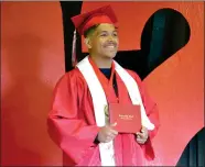  ?? RECORDER PHOTO BY ALEXIS ESPINOZA ?? Eric Jacuinde celebrates his graduation from Lindsay High School on the gymnasium stage Wednesday morning during the first day of LHS’ graduation ceremony.