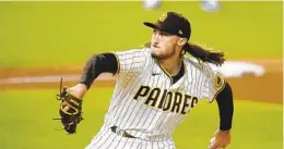  ?? SUE OGROCKI AP ?? Padres reliever Matt Strahm, here in the playoffs last season, is slowly progressin­g from knee surgery. There is still no timetable for his return to action.