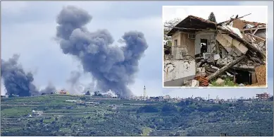  ?? ?? FIRING BACK: Air strike in southern Lebanon. Inset, Israeli home hit in Metula