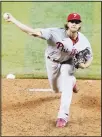  ??  ?? Philadelph­ia Phillies’ Aaron Nola pitches during the third inning of a baseball game against the Miami Marlins on Sept 11 in Miami. (AP)