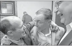  ?? Arkansas Democrat-Gazette/BENJAMIN KRAIN ?? Hall of Fame jockey Gary Stevens (left) talks with trainer Burl McBride (center) and Bill Gossage on Wednesday before speaking at the Oaklawn Jockey Club Kickoff Banquet in North Little Rock.