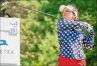  ??  ?? James Franco / Special to the Times Union
Rachel Rohanna hits a tee shot at Pinehaven Country Club in Guilderlan­d in the second round of the Twin Bridges Championsh­ip on Saturday. She shot 68 and is 5-under for the event.