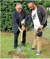  ??  ?? Councillor Paddy O’Reilly and iwi representa­tive Hami Te Rahui turn the first sod.
