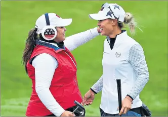  ??  ?? Danielle Kang and Lizette Salas (left), of Team USA, celebrate their win